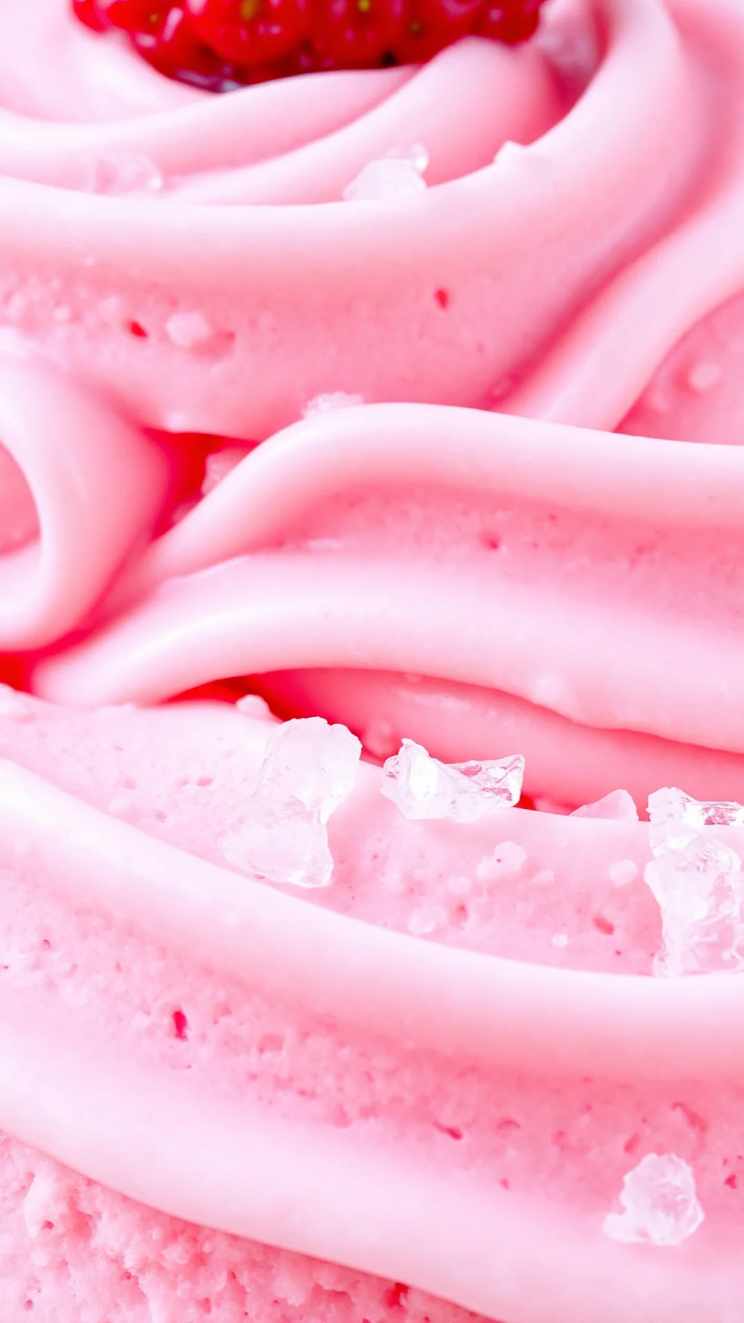 Close-up creamy strawberry ice cream Ninja Creami texture detail, frozen pink dessert, ice crystals visible, fresh strawberry